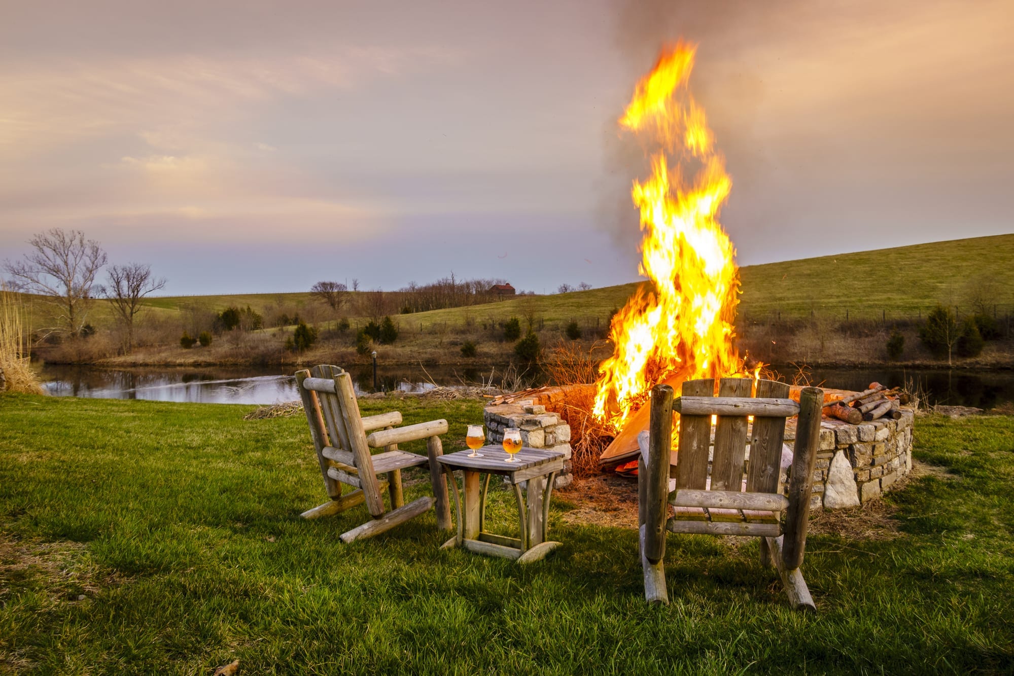 A big bonfire burns outside