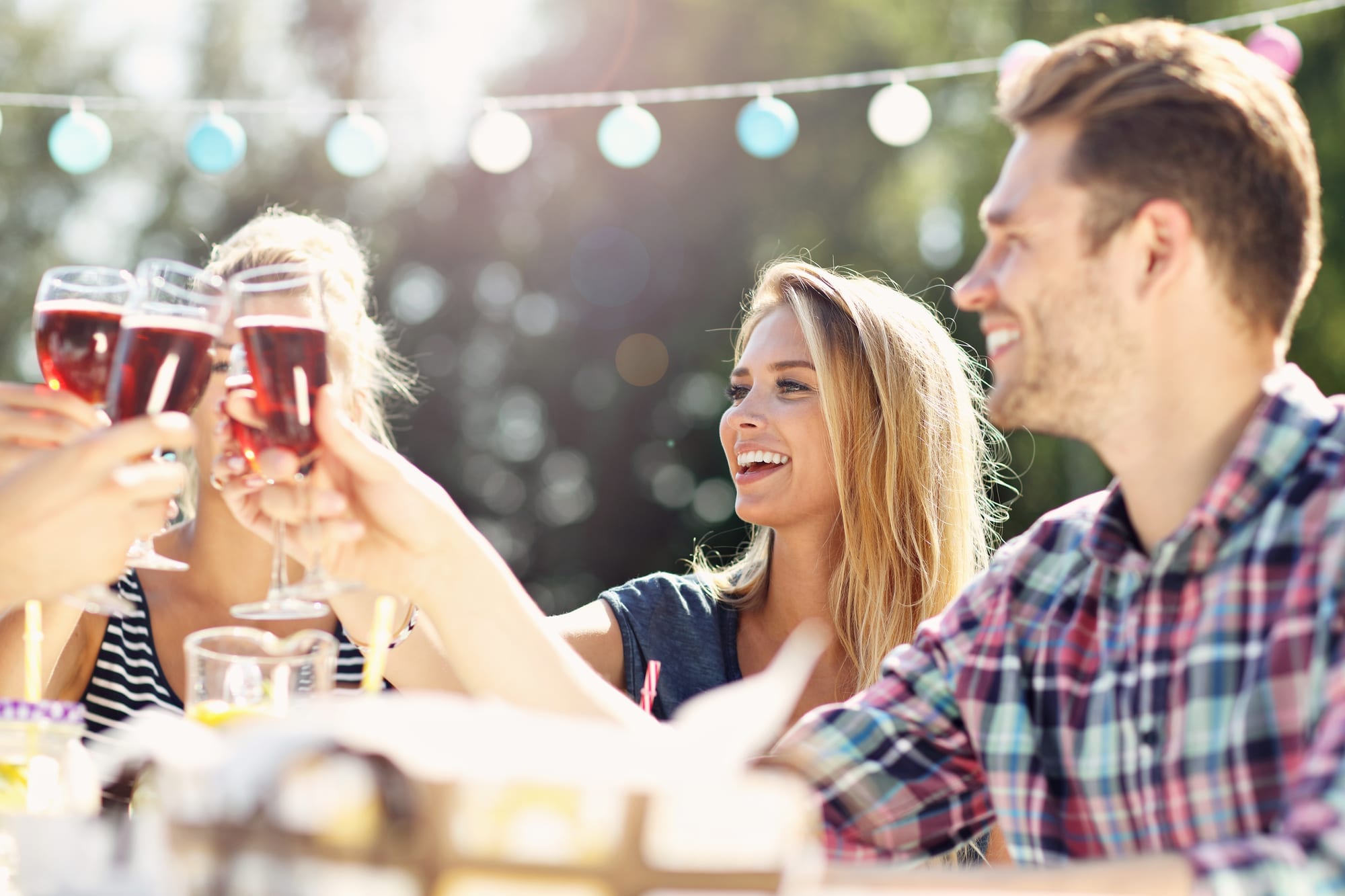 Friends cheers with drinks