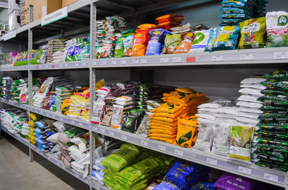 Shelves stocked with garden supplies